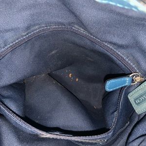 Blue and gray coach purse